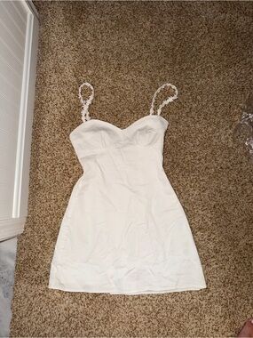 Beginning Boutique white mini dress with flower detailed straps